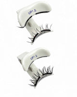 Two pairs of JINYANHUA premium magnetic lashes on labeled applicators
