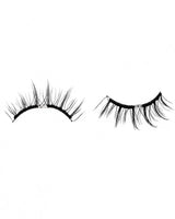 Curved dark false lash pair on a strip with magnetic attachment