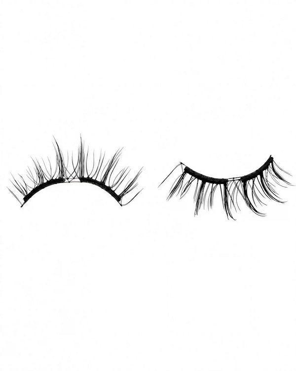 Curved dark false lash pair on a strip with magnetic attachment