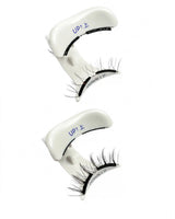 Two dark lash strips with white magnetic lash cases labeled UP and DOWN