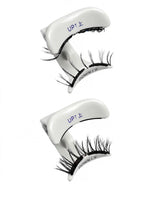 Magnetic fake eyelash strips with white bands, marked UP and DOWN