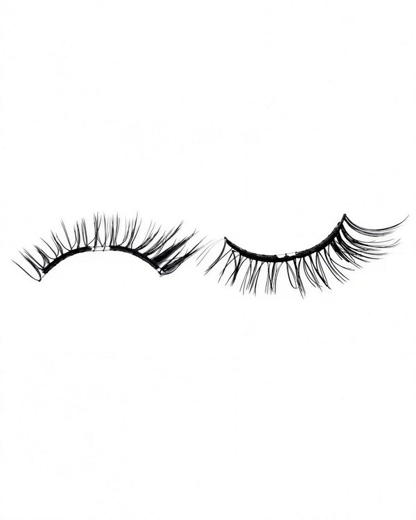 Pair of false eyelash strips with short black, curled, wispy lashes.
